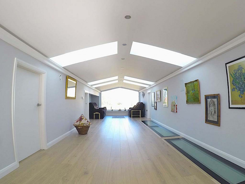 in floor lighting in large hallway