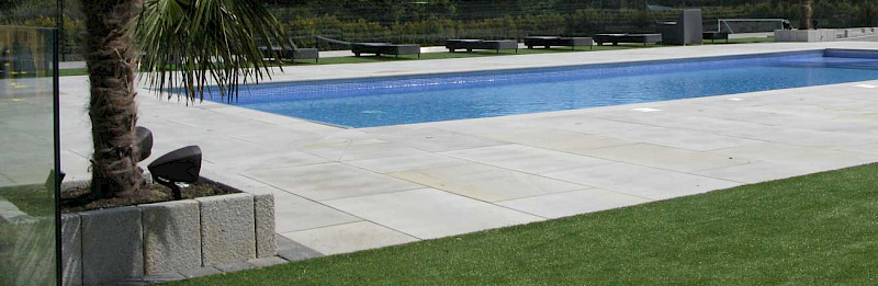 outdoor speakers by triad around a swimming pool