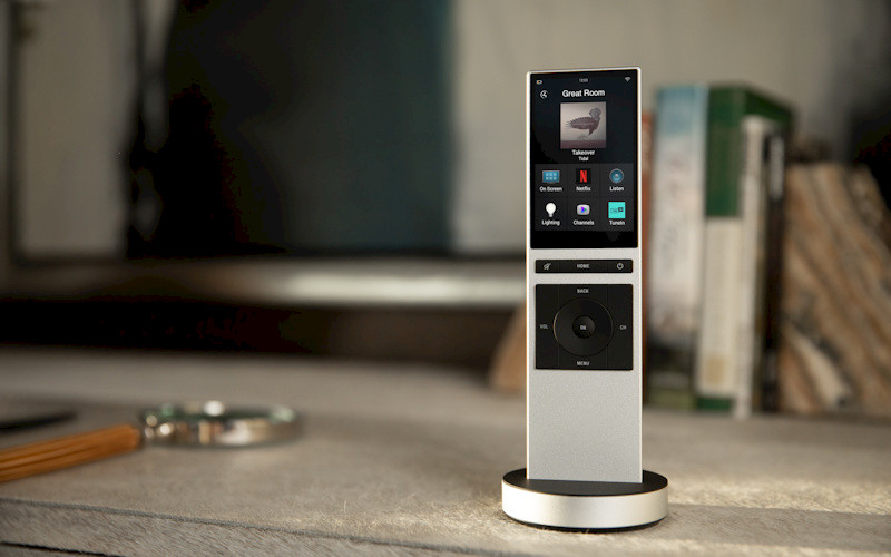 Multi function smart home controller with touch screen display in silver on a desk