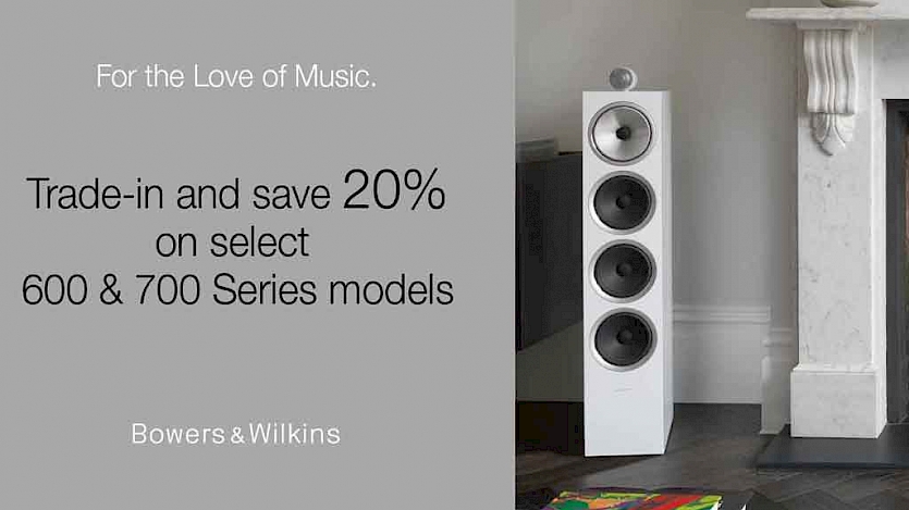 white 700 series speaker next to offer text