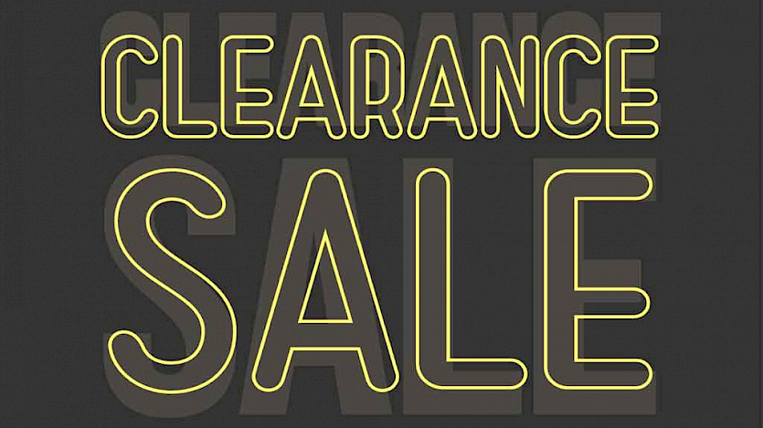 clearance sale yellow text on black background