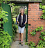 Elizabeth Gould in a walled garden